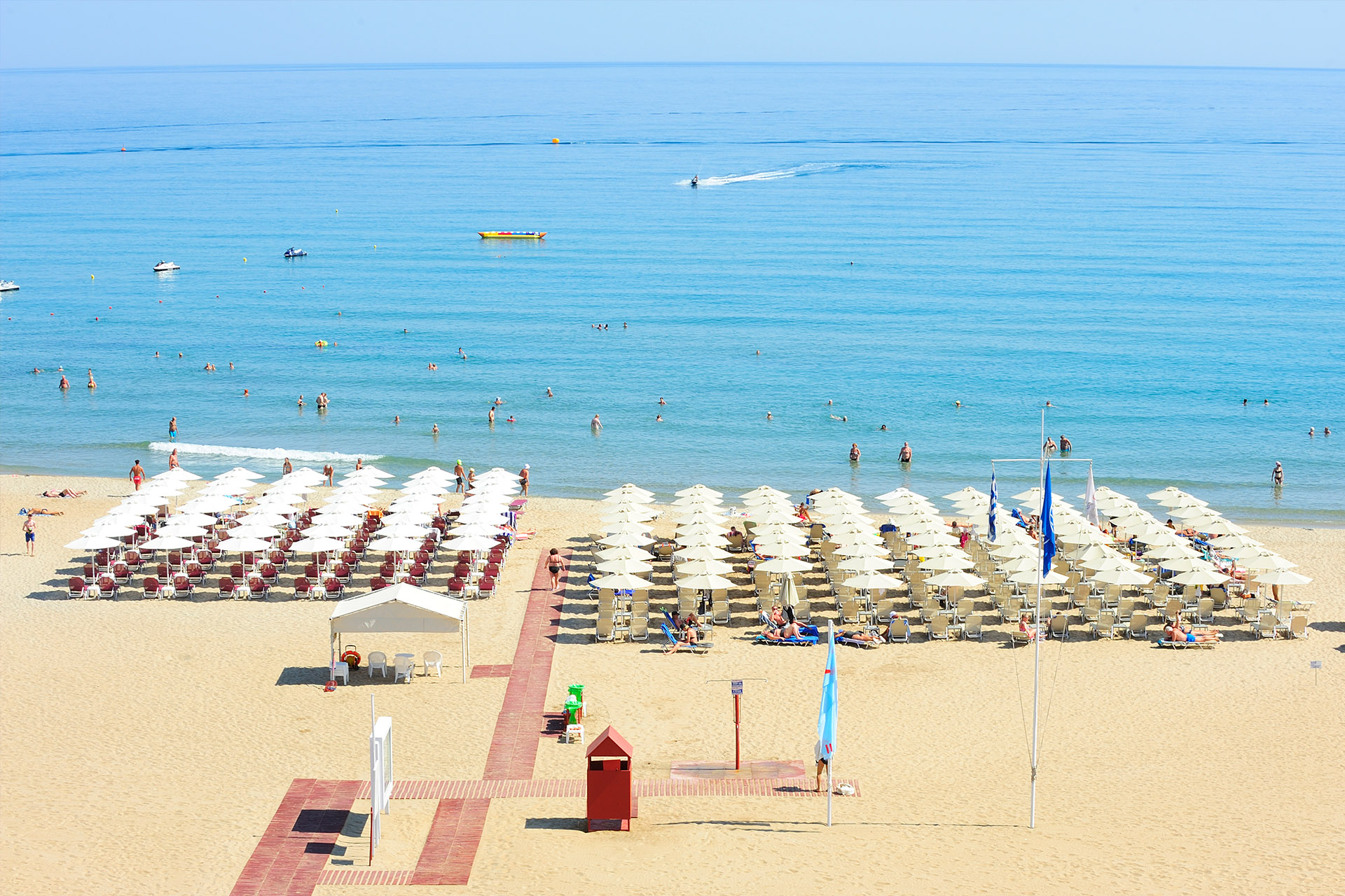 View of the beach outside of Ilios Hotel